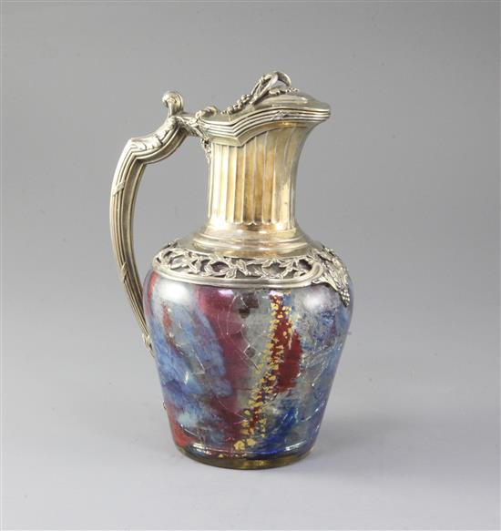 A French 950 standard silver gilt mounted coloured crackle glass claret jug, 22cm.